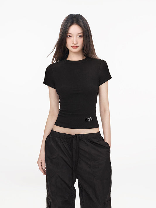 Fitted Ribbed Crew Neck Crop Tee with Embroidered Hem Detail