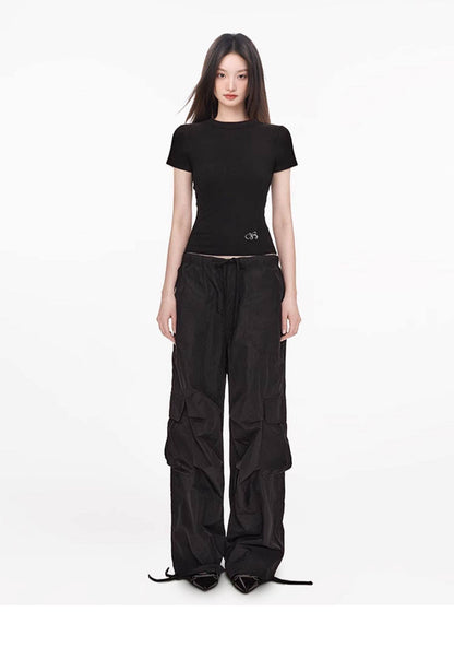 Fitted Ribbed Crew Neck Crop Tee with Embroidered Hem Detail